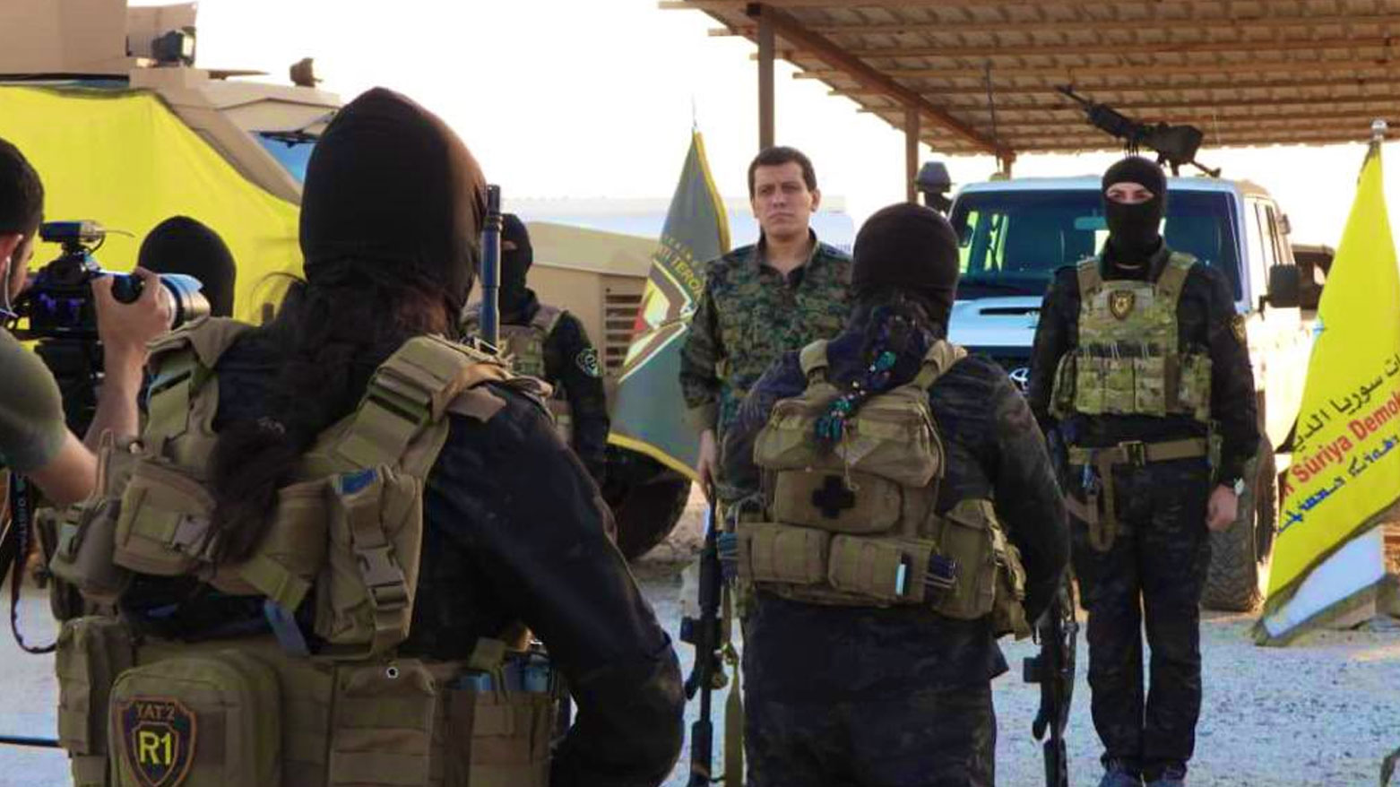 SDF commander, Mazloum Abdi, standing In front of the Counter-Terrorism Units (YAT) members. (Photo: Abdi's X)