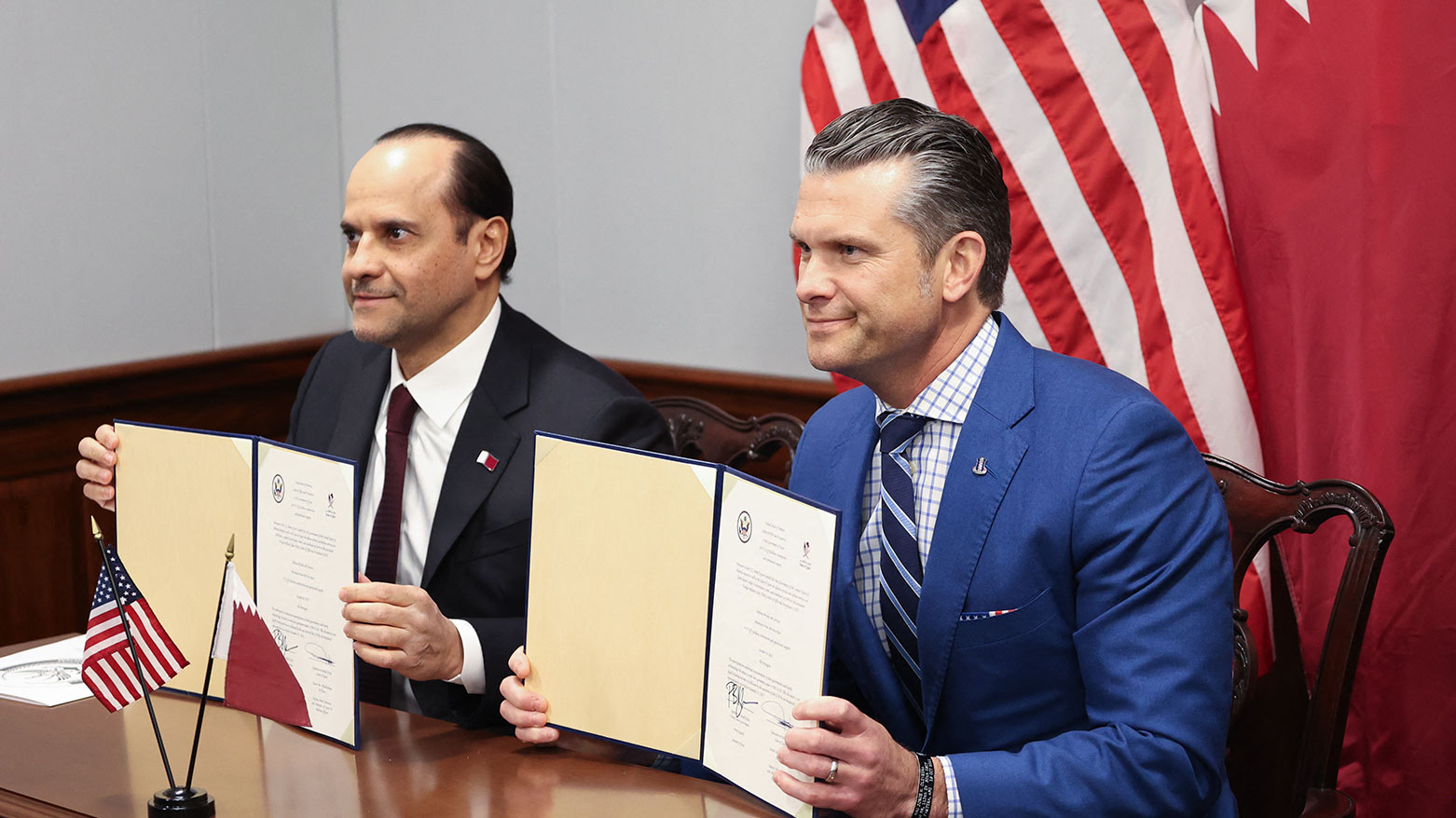 U.S. Defense Secretary Pete Hegseth (R), and Qatari Defense Minister Sheikh Saoud bin Abdulrahman Al-Thani (L). (AFP)