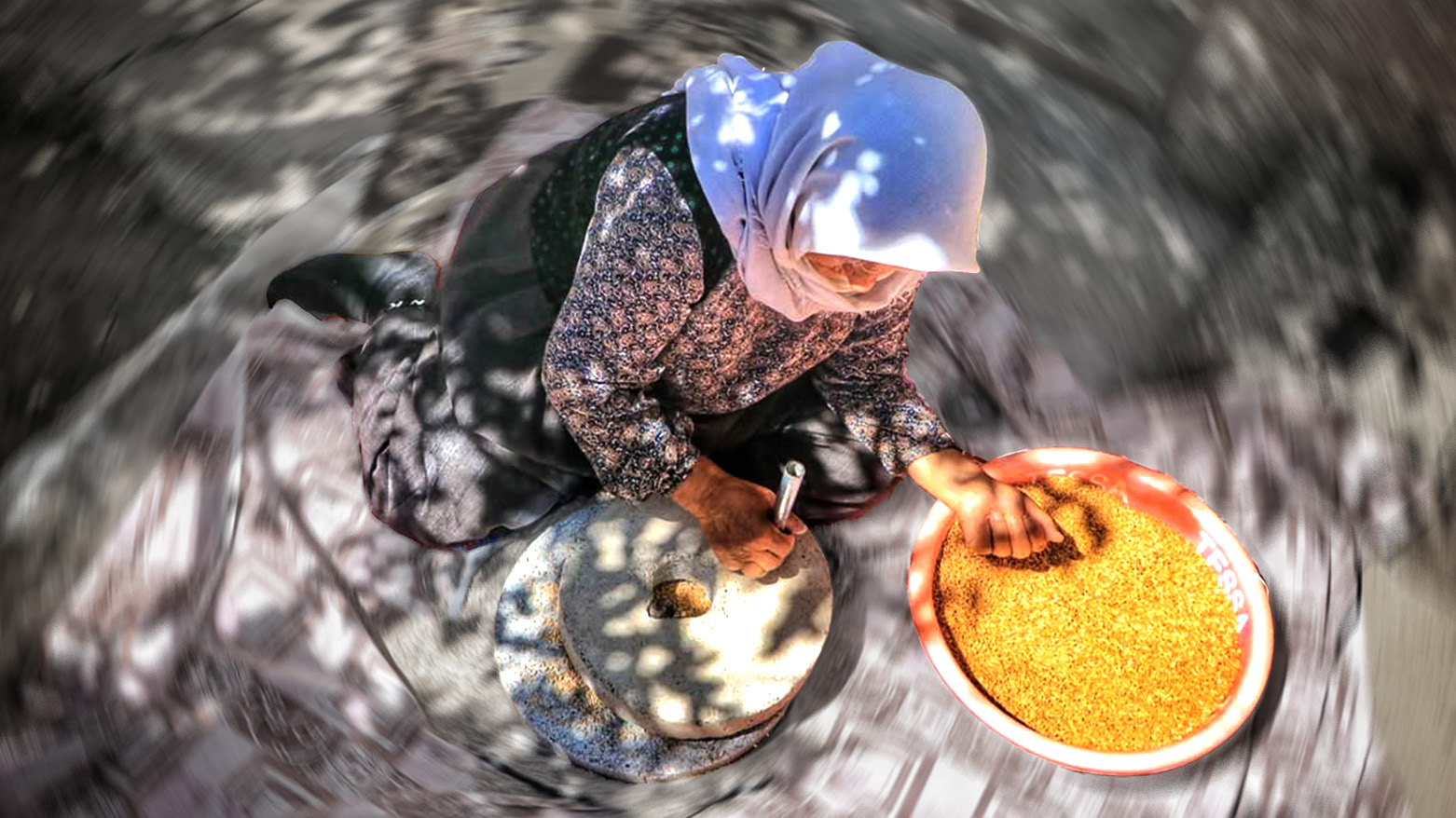 A Kurdish woman using the Destar. (Photo: Kurdistan24)