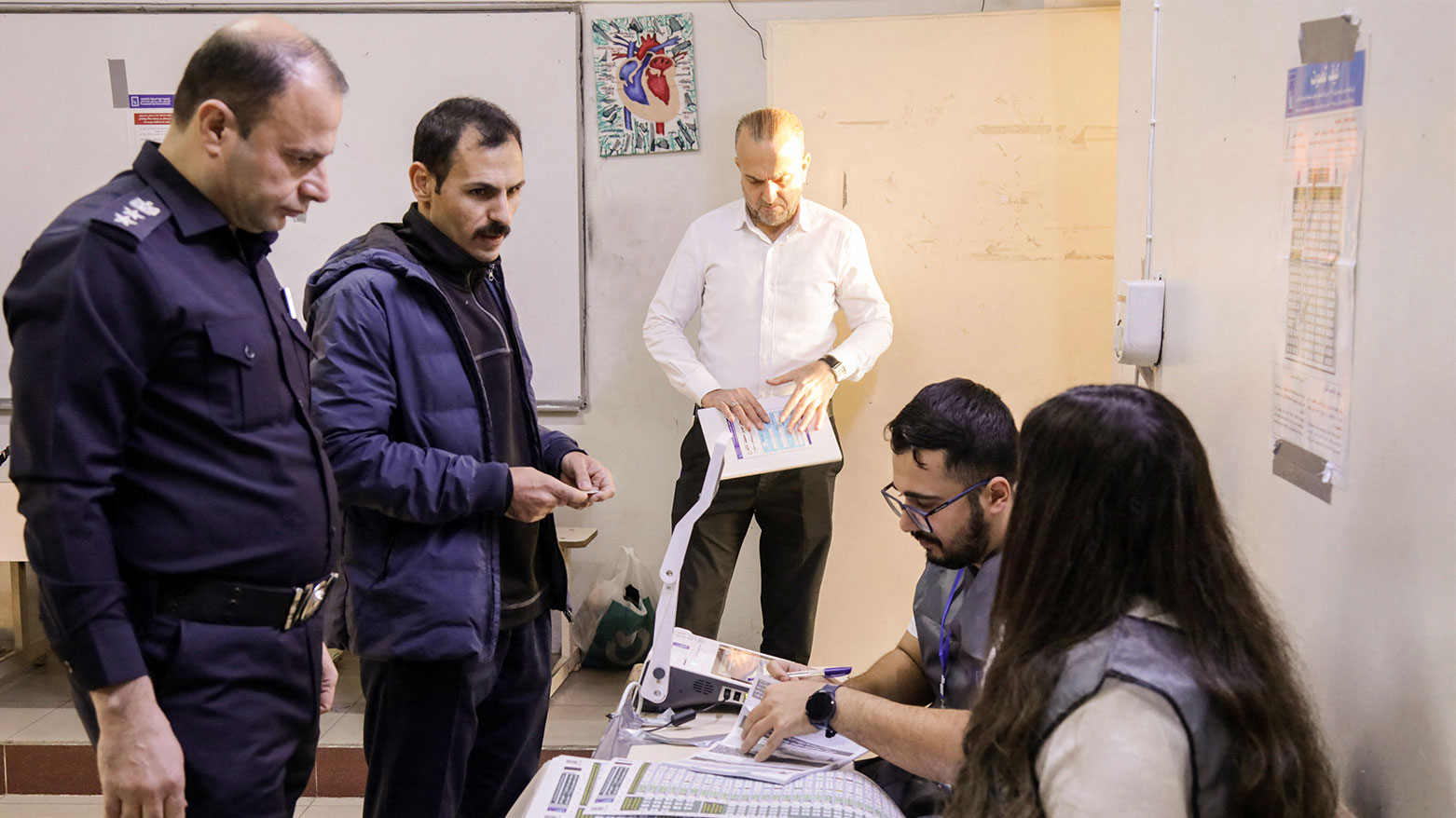 Members of Kurdish security forces take part at a polling station to vote ahead of the Nov. 11 parliamentary election in Erbil, Nov. 9, 2025. (Photo: AFP)
