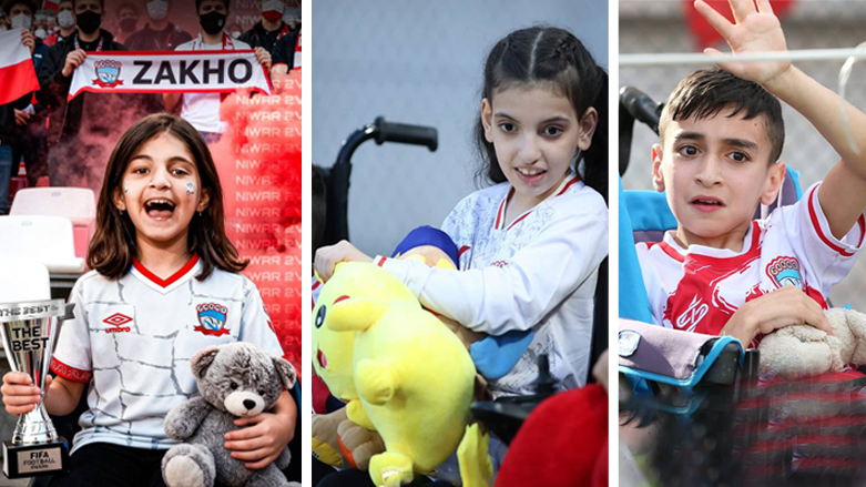 Young Zakho SC football fans holding stuffed toys and wearing their team jerseys. (Photo: Kurdistan24)