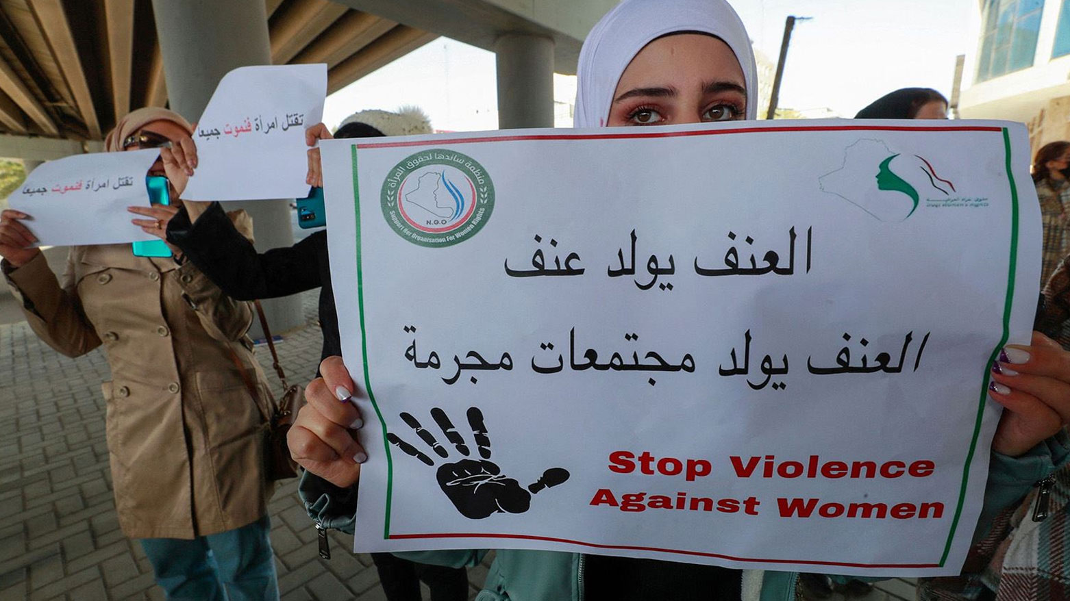 من مسيرة نسوية ضد العنف لمنظمة "ساندها لحقوق الإنسان" في العراق (أرشيف فرانس برس)