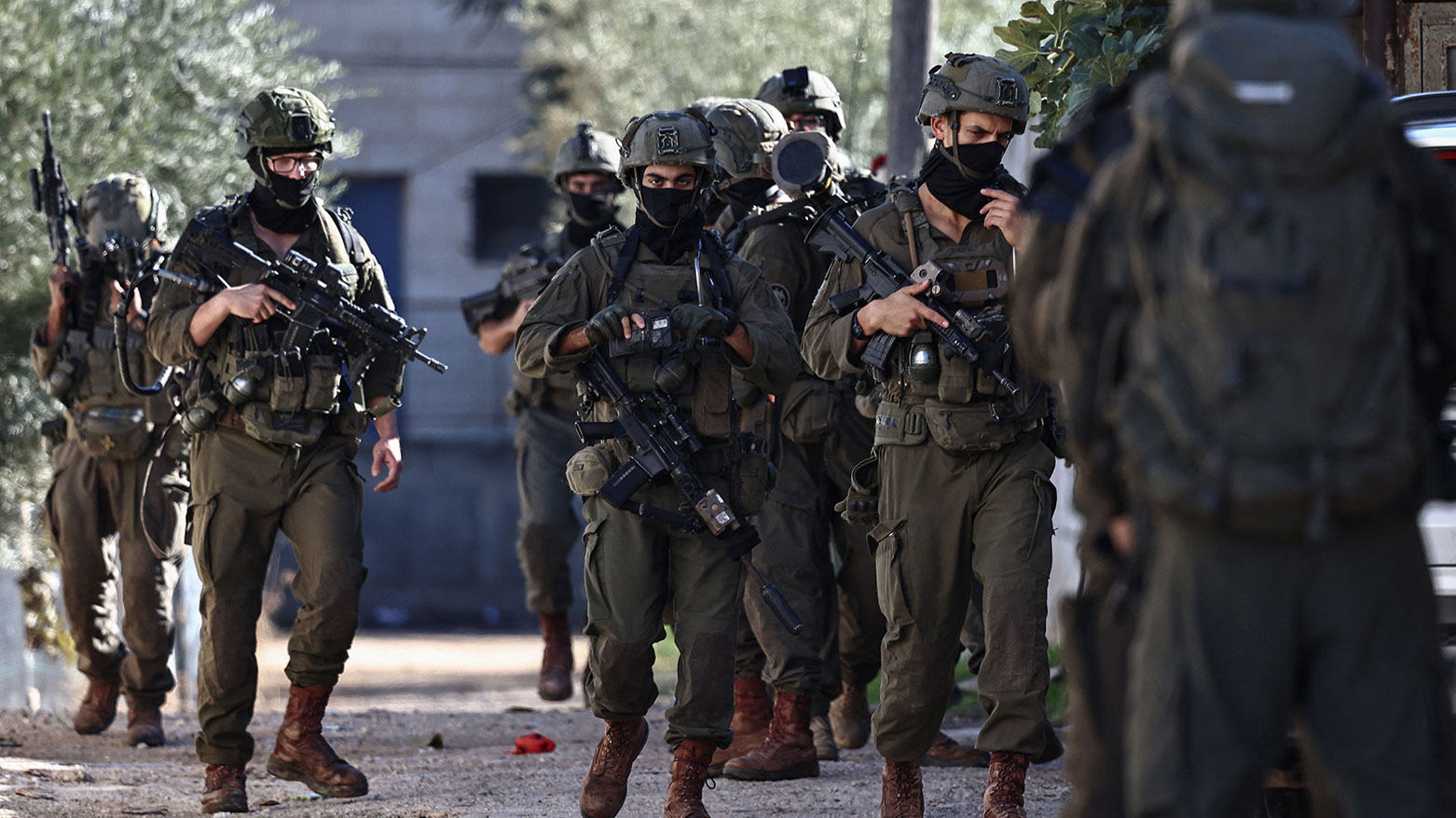 Israeli soldiers patrol the streets of Tubas in the occupied West Bank during a military operation on Nov. 26, 2025. (AFP)