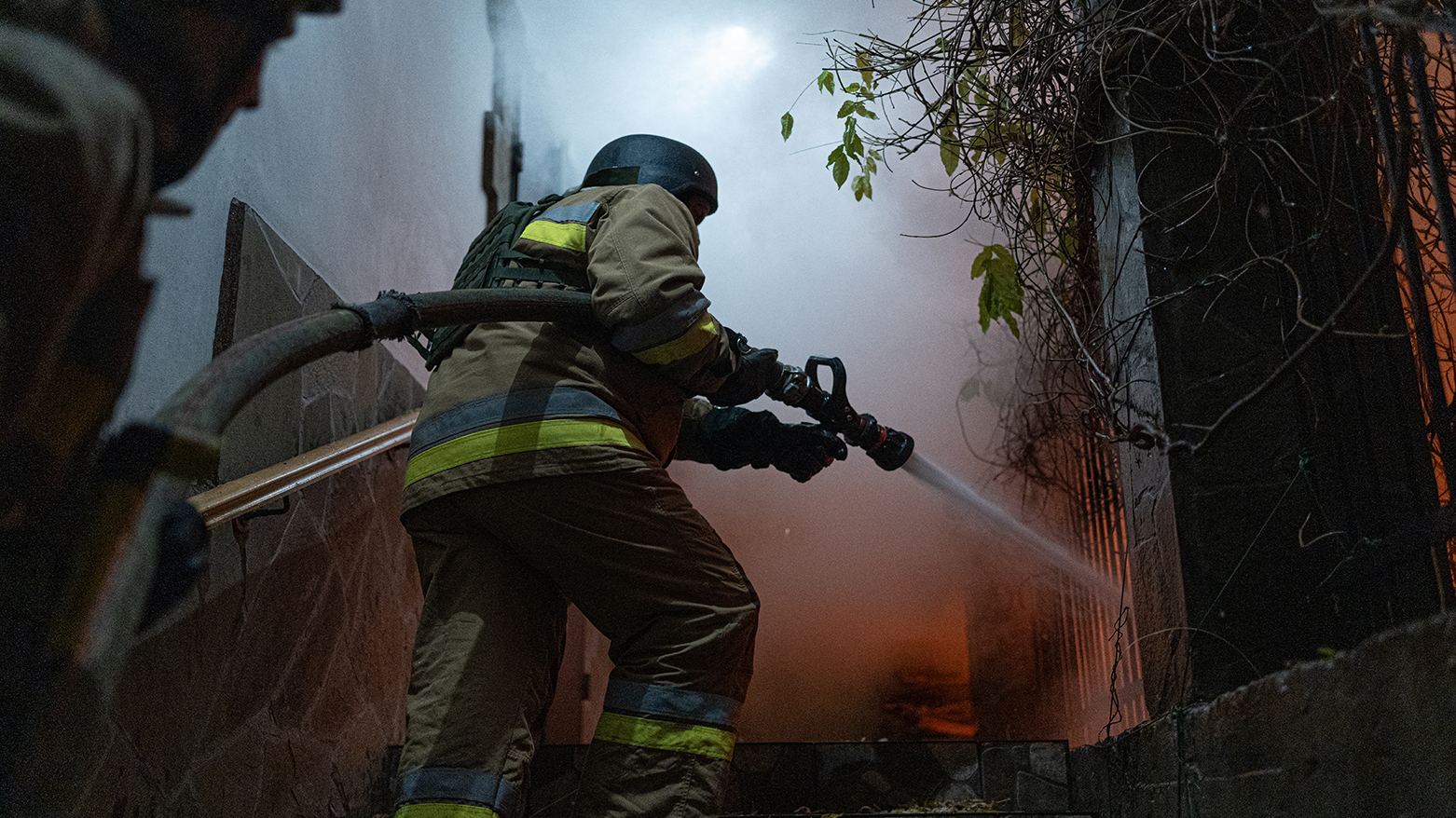 Firefighters put out a fire in a damaged private house following a drone attack to Kyiv on Nov. 29, 2025. (Photo: AFP)