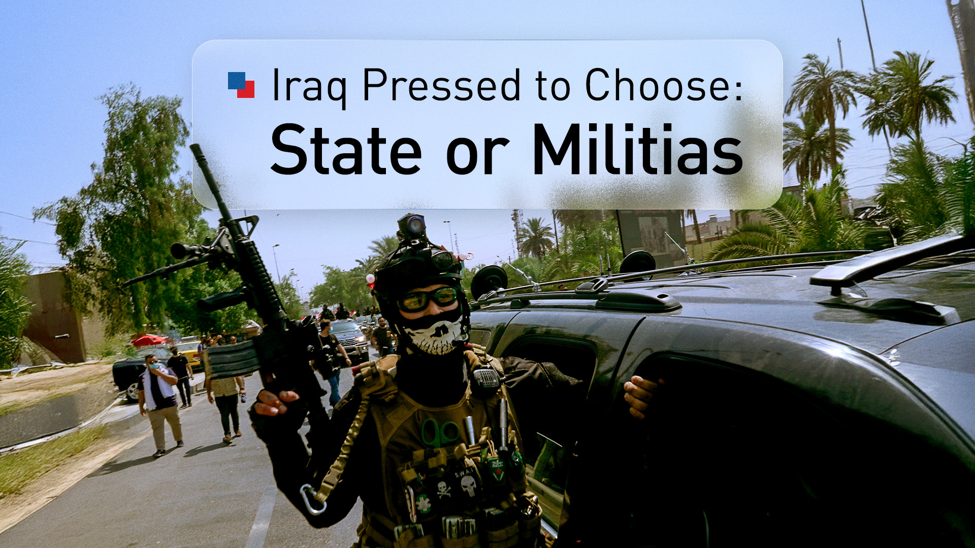 A member of Iran-backed militia in Iraq holding a weapon in Baghdad. (AP)