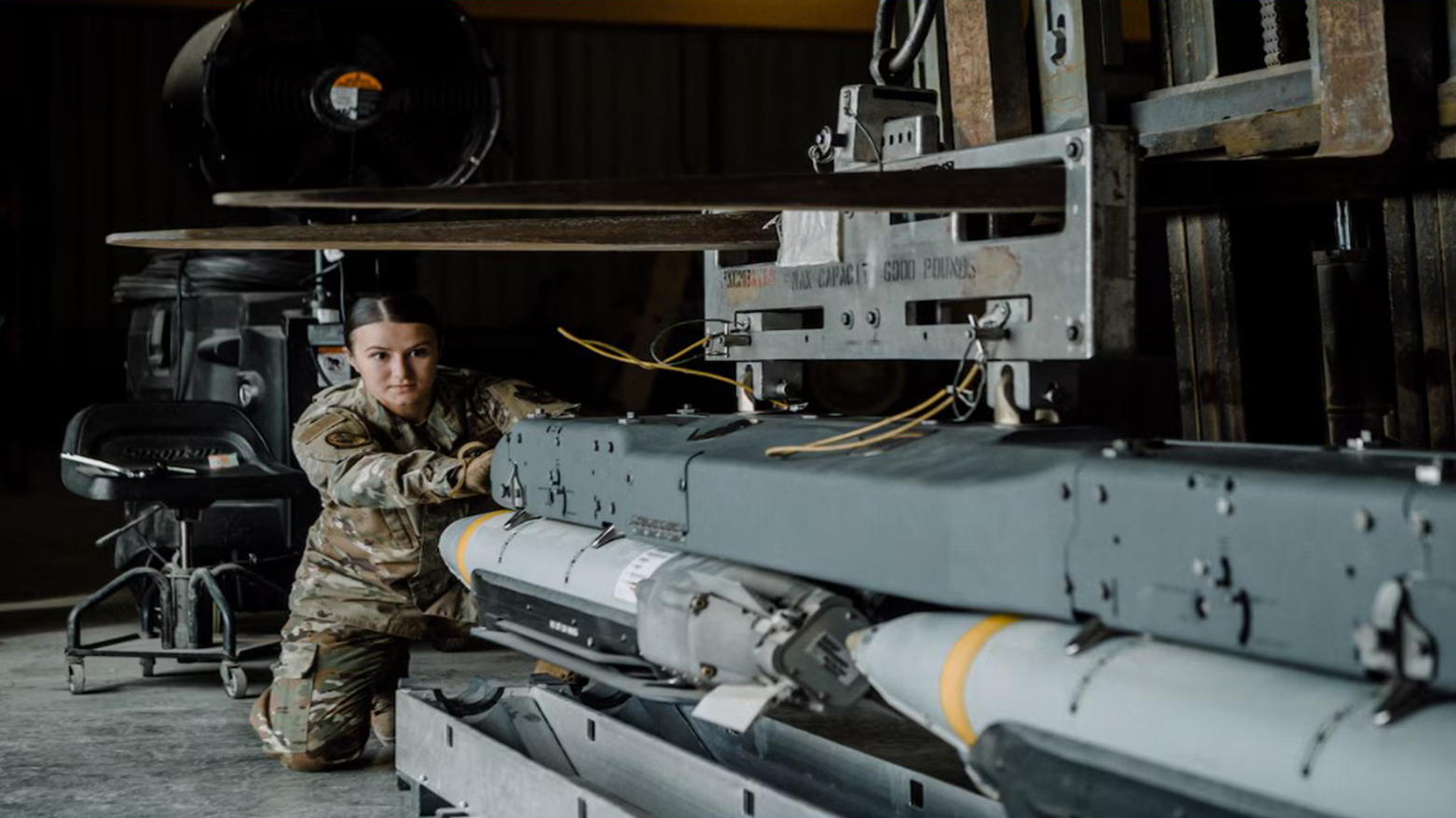U.S. Air Force Senior Airman Angelica Range, munitions four GBU-39 small diameter bombs on Al Udeid Air Base, Qatar, Nov. 27, 2020. (Photo: USAF)