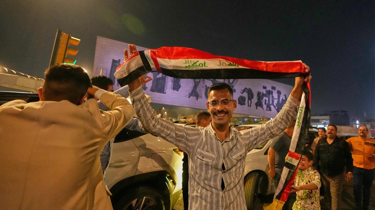Baghdad residents cheer in Tahrir Square, Baghdad, Iraq, Wednesday, Nov. 12, 2025. (AP)
