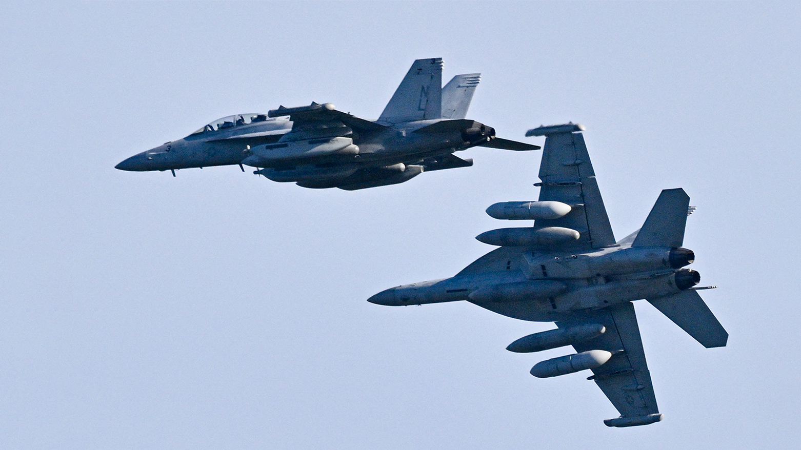 US Navy Boeing EA-18G Growlers fly over José Aponte de la Torre Airport on Dec. 15, 2025 in Ceiba, Puerto Rico. (AFP)