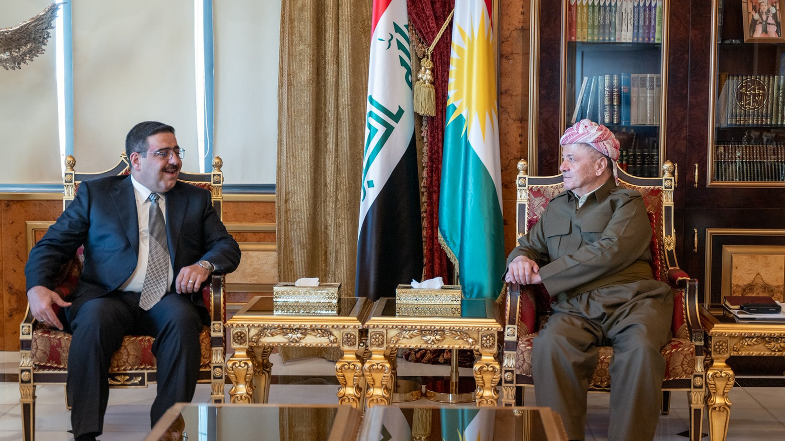 President Masoud Barzani, R, Iraqi Minister of Trade Atheer Dawood al-Ghurairi, Pirmam, Erbil, Dec. 20, 2025. (Photo: Barzani Office Media)
