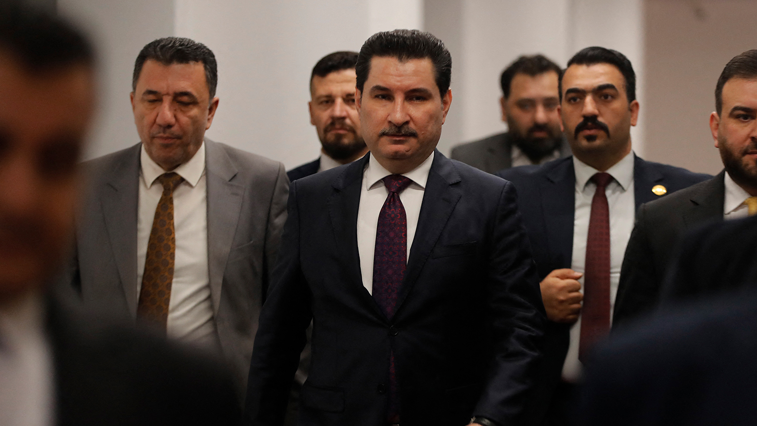 Shakhwan Abdullah (C), the candidate for Iraqi Parliament's 2nd Deputy Speaker, enters the parliament hall in Baghdad, Dec. 29, 2025. (AFP)