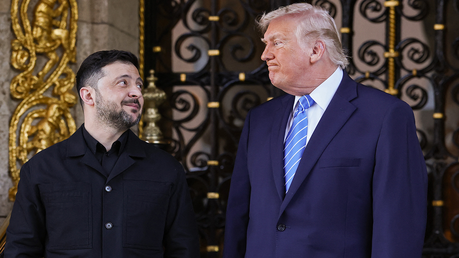 U.S. President Donald Trump, R, greets Ukrainian President Volodymyr Zelensky at his Mar-a-Lago club in Palm Beach, Florida, Dec. 28, 2025. (AFP)