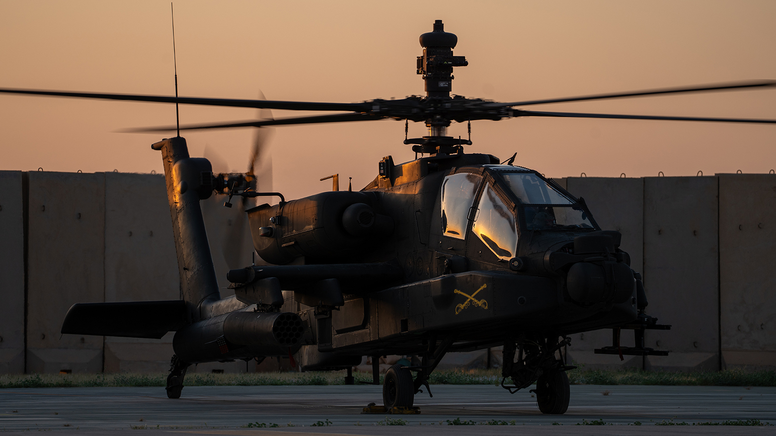 AH-64 Apache helicopter assigned to Task Force Cardinal conducts ground runs prior to a Maintenance test flight on on 20 April 2025 at Al Asad Air Base, Iraq. (DVIDS)