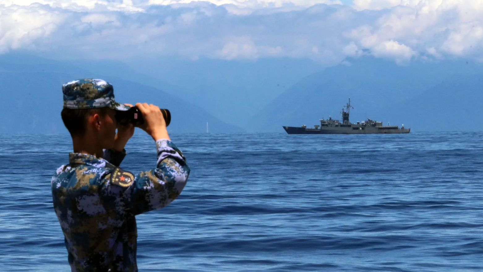 A soldier looks through binoculars during combat exercises and training of the navy of the Chinese People's Liberation Army in the waters around Taiwan on Aug. 5, 2022. (Photo: China)