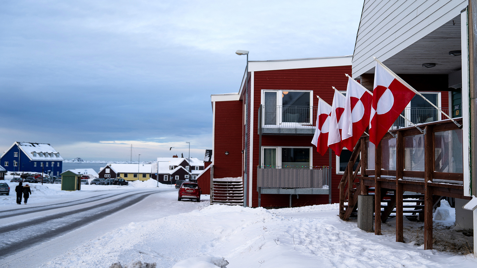 Greenlandic flags are fixed on a building in Nuuk, Greenland, on January 14, 2026. (AFP)