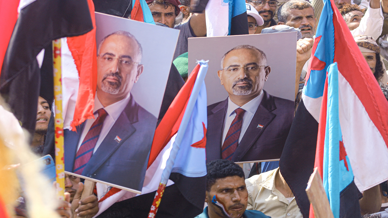 Yemenis brandishing the People's Republic of South Yemen flag and the image of the STC president Aidarous Al-Zubaidi, rally in support of Yemen's southern separatists, in Aden, Jan. 10, 2026. (AFP)