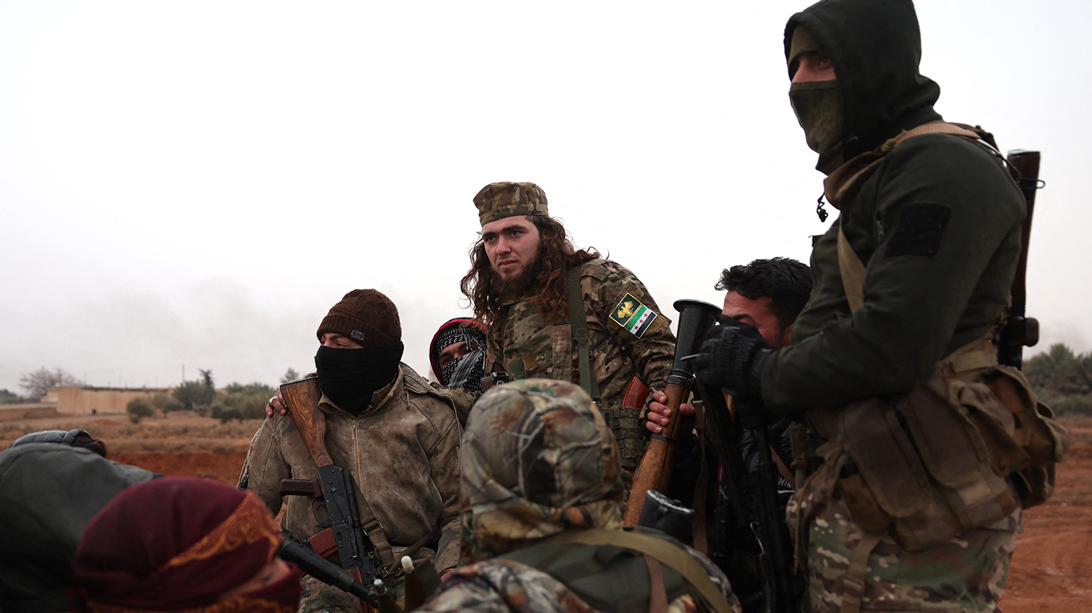 Syrian Arab forces deploy near the front line in Dibsi Faraj, in the northern Syrian Raqa province, Jan. 17, 2026. (AFP)