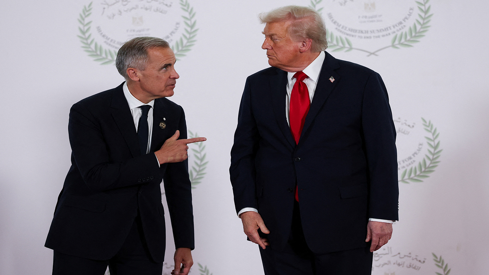 President Donald Trump, R, and Canadian PM Mark Carney, Sharm el-Sheikh, Egypt, Oct. 13, 2025. (Photo: AP)