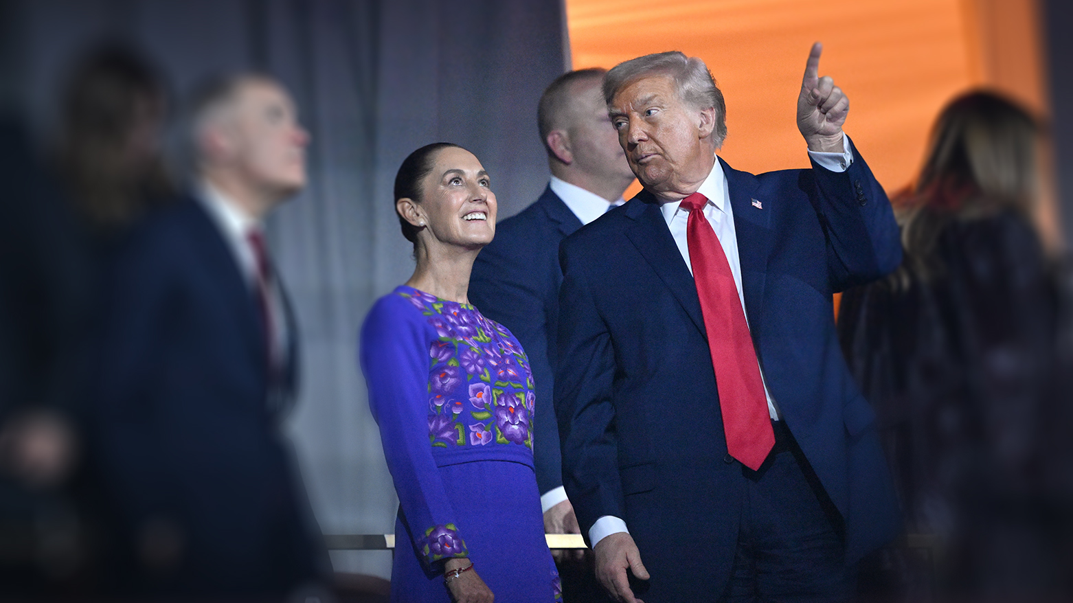 U.S. President Donald Trump speaks with Mexican President Claudia Sheinbaum at the Kennedy Center in Washington, Dec. 5, 2025. (AP)