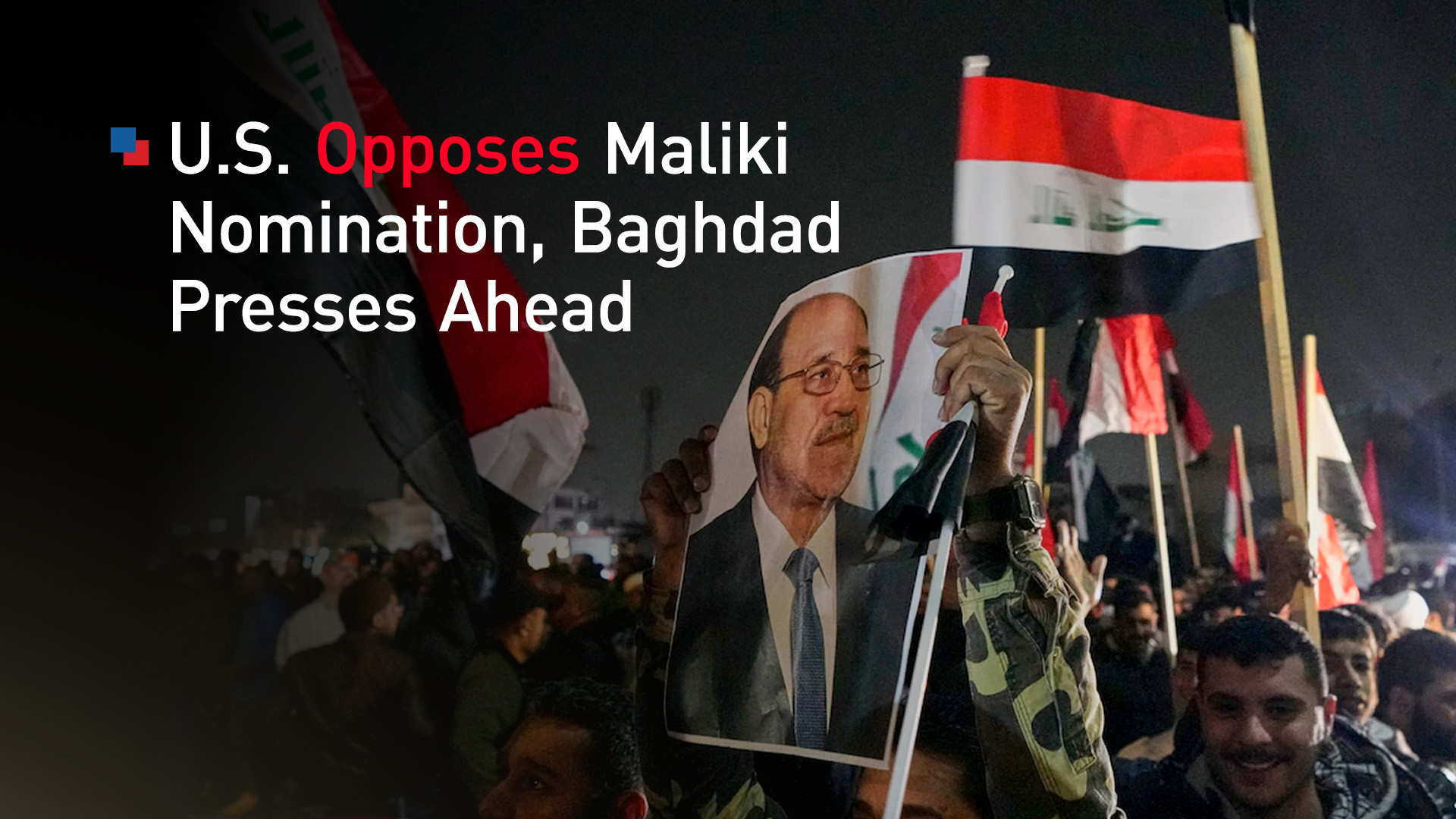 A man holds a portrait of former PM Nouri al-Maliki on Thursday while protesting President Donald Trump near Baghdad's Green Zone. (AP)