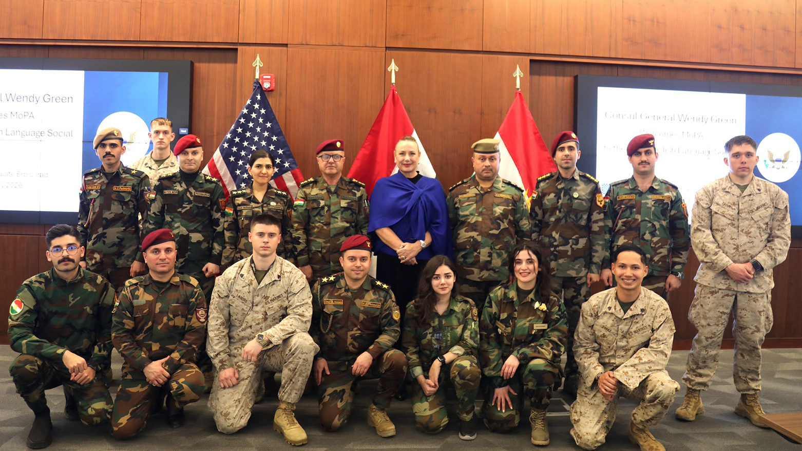 US Consul General Wendy Green poses for a group photo with U.S. Army soldiers and graduates of the Peshmerga English Language Course in Erbil. (US Consulate)