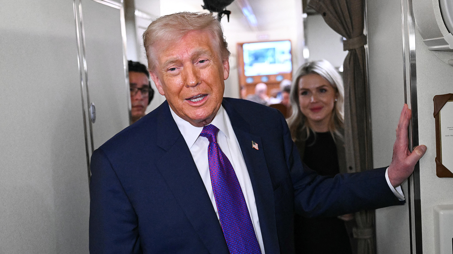 President Donald Trump speaks to reporters aboard Air Force One shortly before takeoff, Thursday, Feb. 19, 2026. (AFP)
