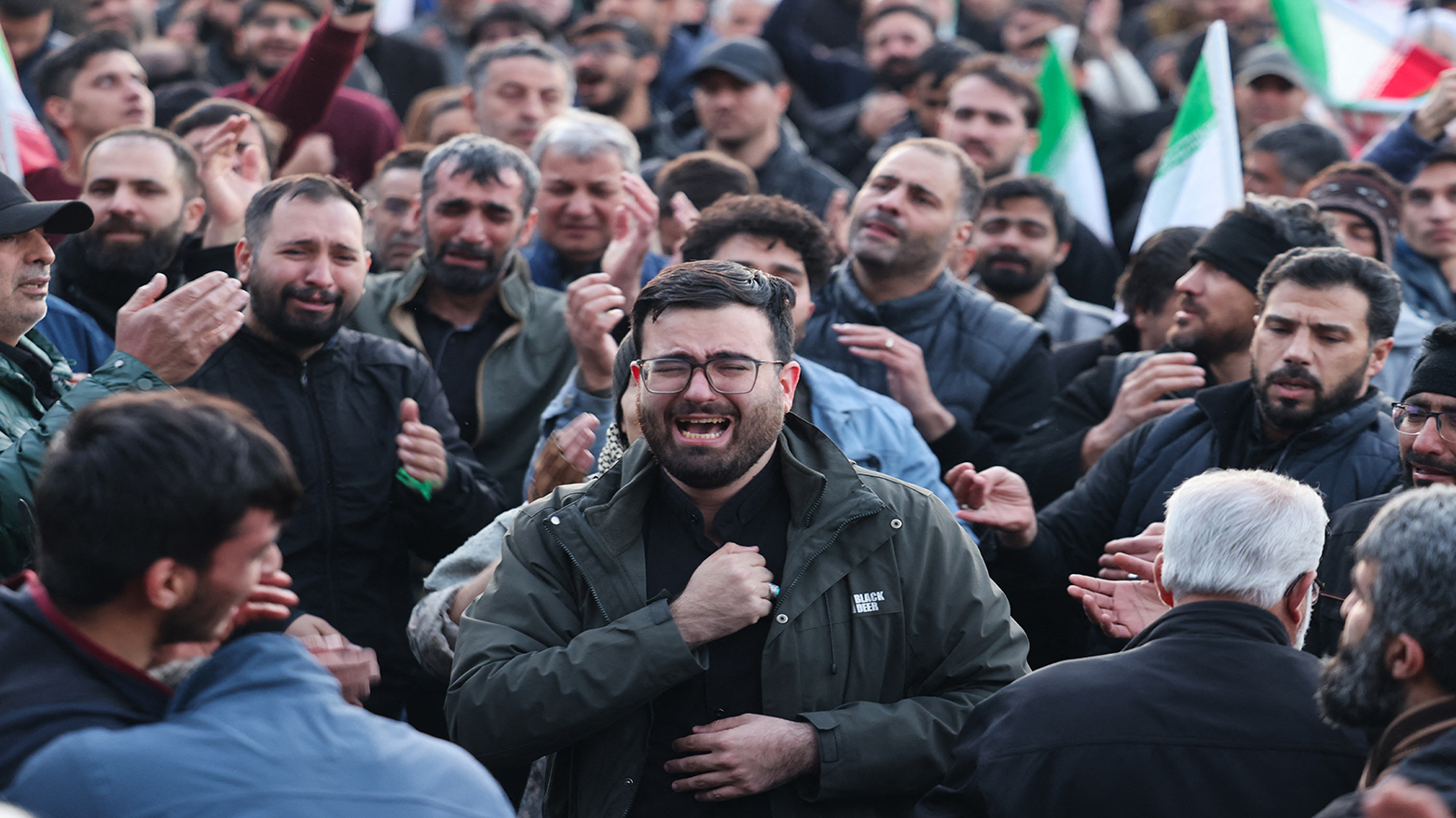 People mourn the death of Iran’s supreme leader Ayatollah Ali Khamenei, who was killed in joint US and Israeli strikes, at a square in Tehran on March 1, 2026. (AFP)