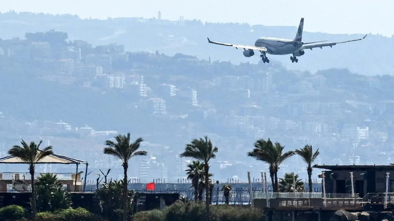 A plane departs from Beirut–Rafic Hariri International Airport in Beirut, as Iranian nationals, including diplomats, were evacuated from the Lebanese capital aboard a Russian aircraft. (AFP)