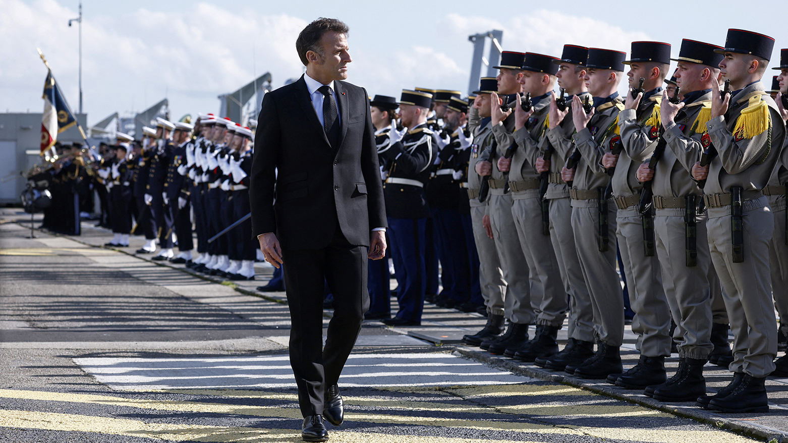 France's President Emmanuel Macron reviews the troops during his visit to the Nuclear Submarine Navy Base of Ile Longue in Crozon, north-western France on Mar. 2, 2026. (AFP)