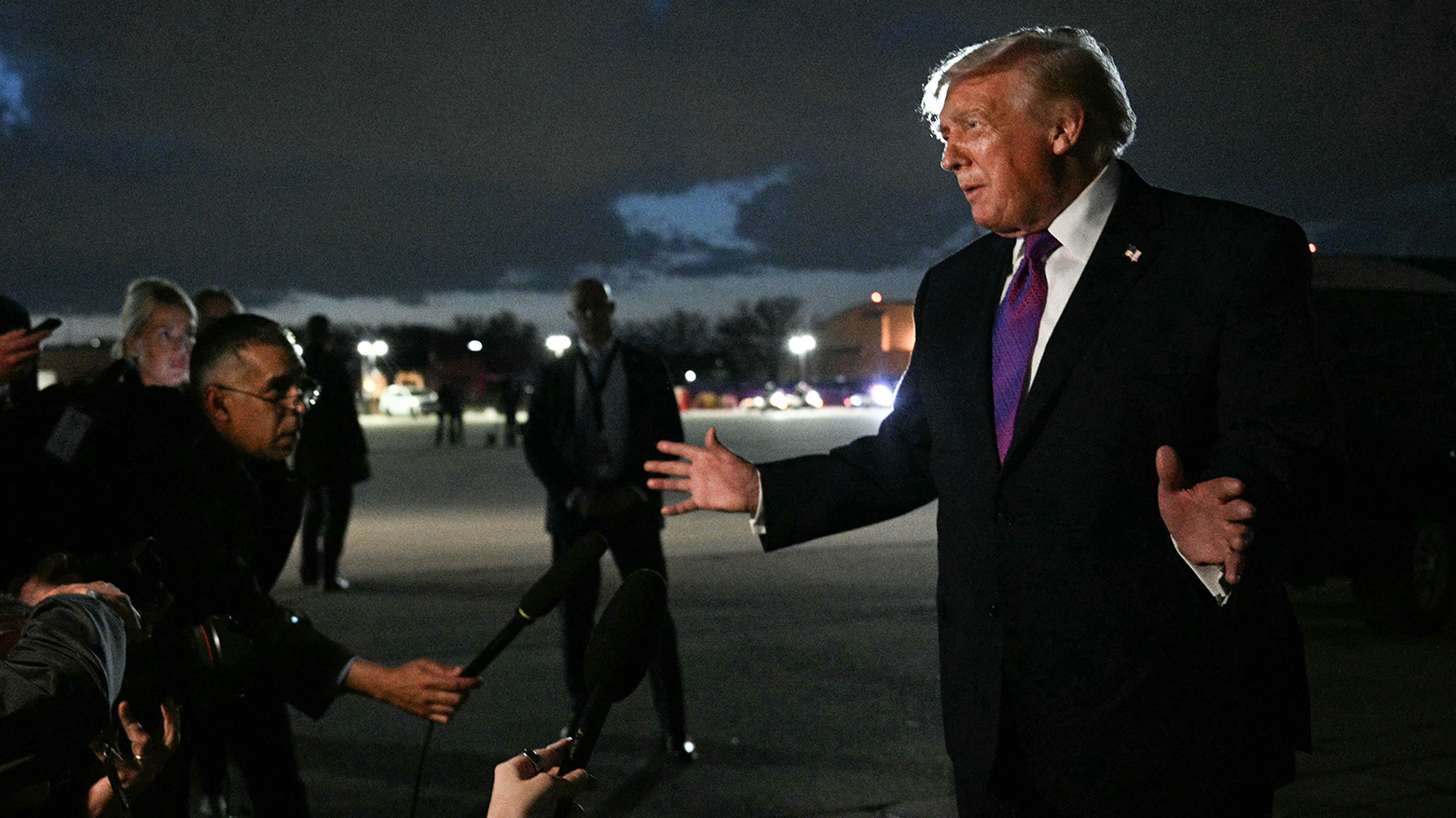 US President Donald Trump speaks to journalists upon returning to Joint Base Andrews, Maryland on Mar. 11, 2026. (AFP)
