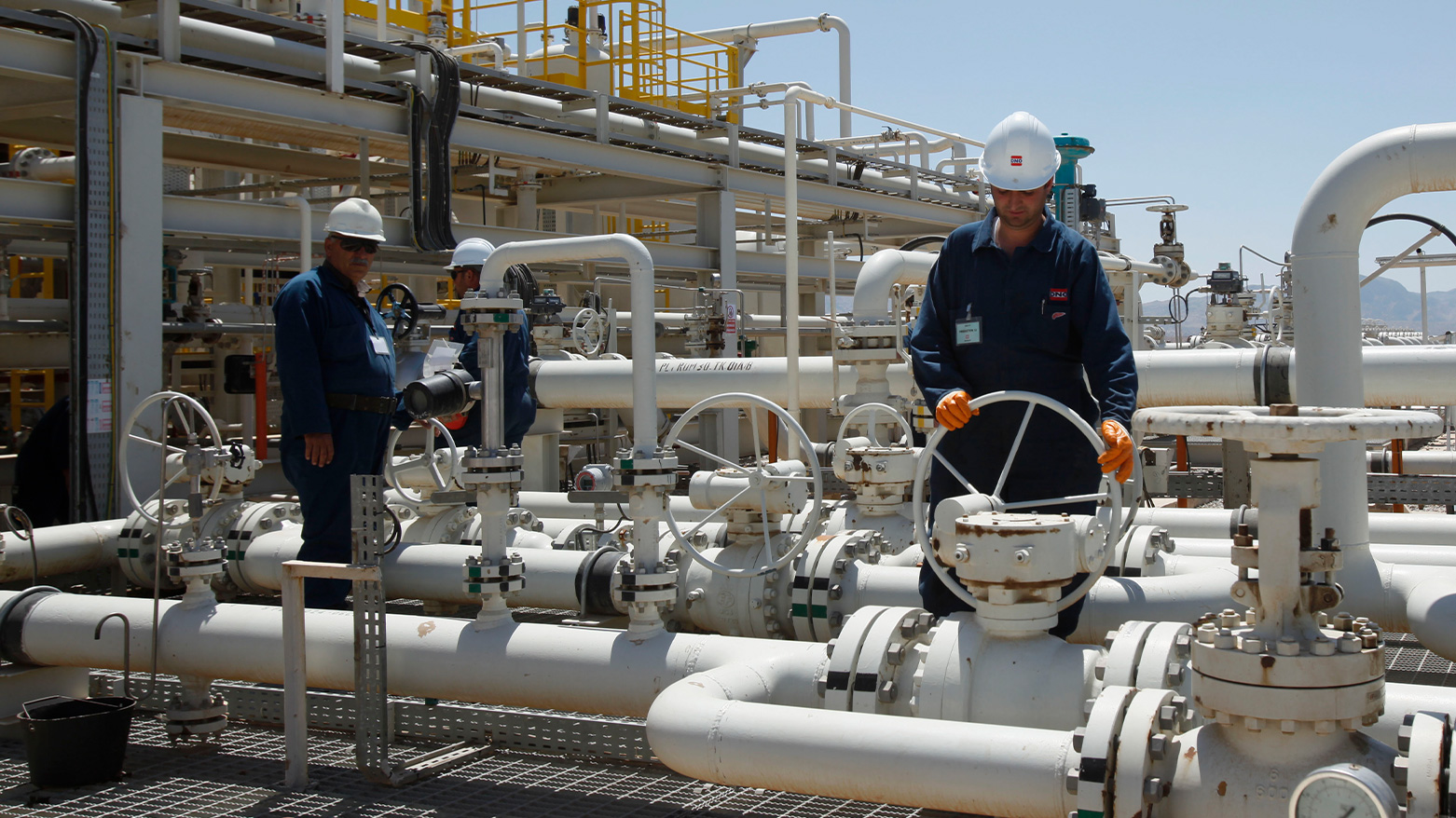 Employees work at the Tawke oil field in the Kurdistan Region. (Photo: AP)