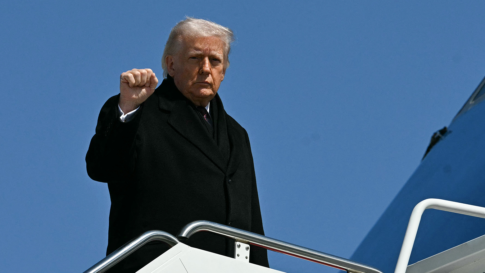 US President Donald Trump boards Air Force One at Joint Base Andrews, Maryland, March 18, 2026. (AFP)