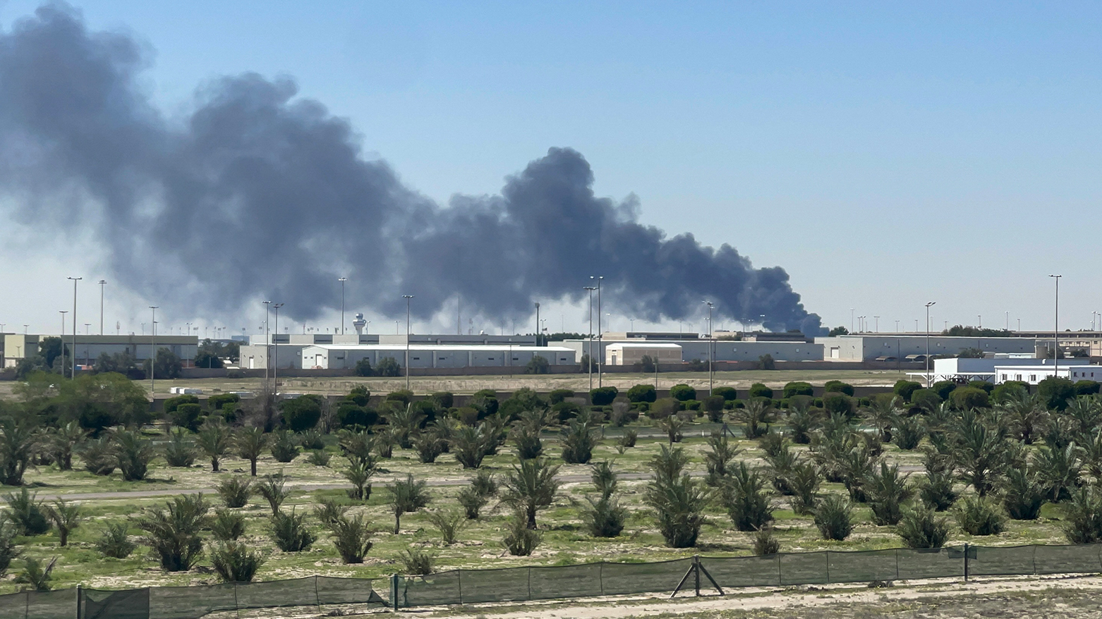 Smoke rises from an area of Kuwait's international airport after a reported drone strike on April 1, 2026. (AFP)