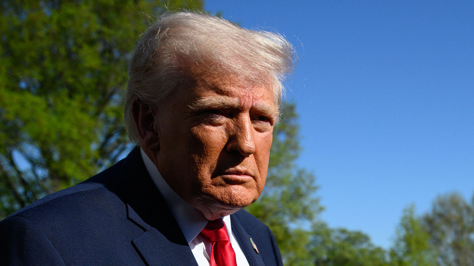 U.S. President Donald Trump speaks with reporters prior to boarding Marine One as he departs from the South Lawn of the White House in Washington, DC, on April 11, 2026. (Photo: AFP)