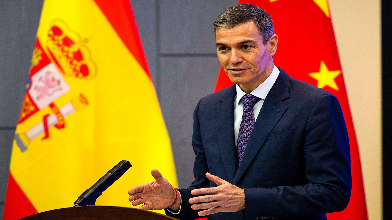 Spain's Prime Minister Pedro Sanchez delivers a speech at the University of Chinese Academy of Sciences in Beijing on April 13, 2026. (AFP)