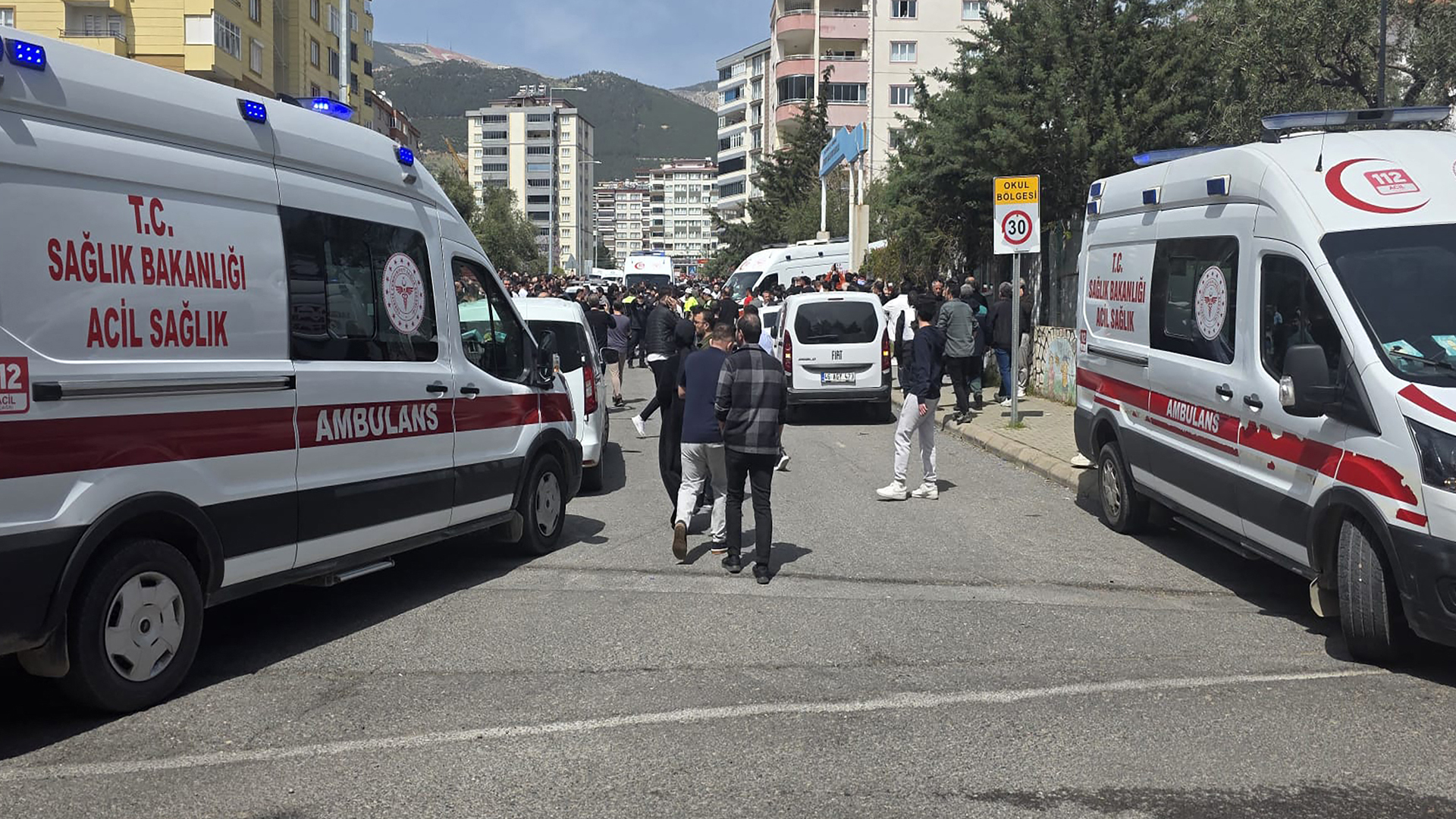 Turkish news agency DHA (Demiroren News Agency) shows first aid officers ambulances parking next to a school in Kahramanmaras, southern Turkey. (Photo: AFP)