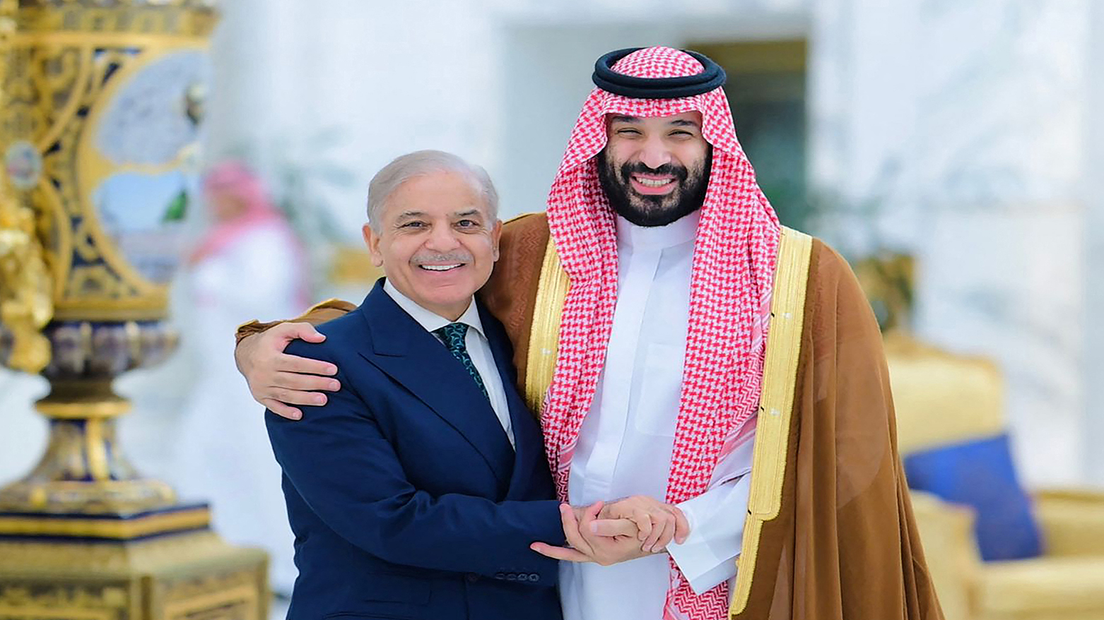 Saudi Arabia's Crown Prince Mohammed bin Salman (R) greeting Pakistan's PM Shehbaz Sharif prior to their meeting in Jeddah, April 15, 2026. (AFP)