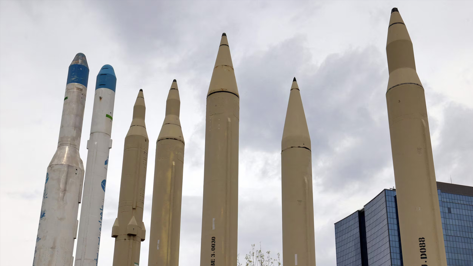 Mockups of domestically-made Iranian missiles are displayed at an exhibition outside the Defence Museum in Tehran on Mar. 31, 2026. (AFP)