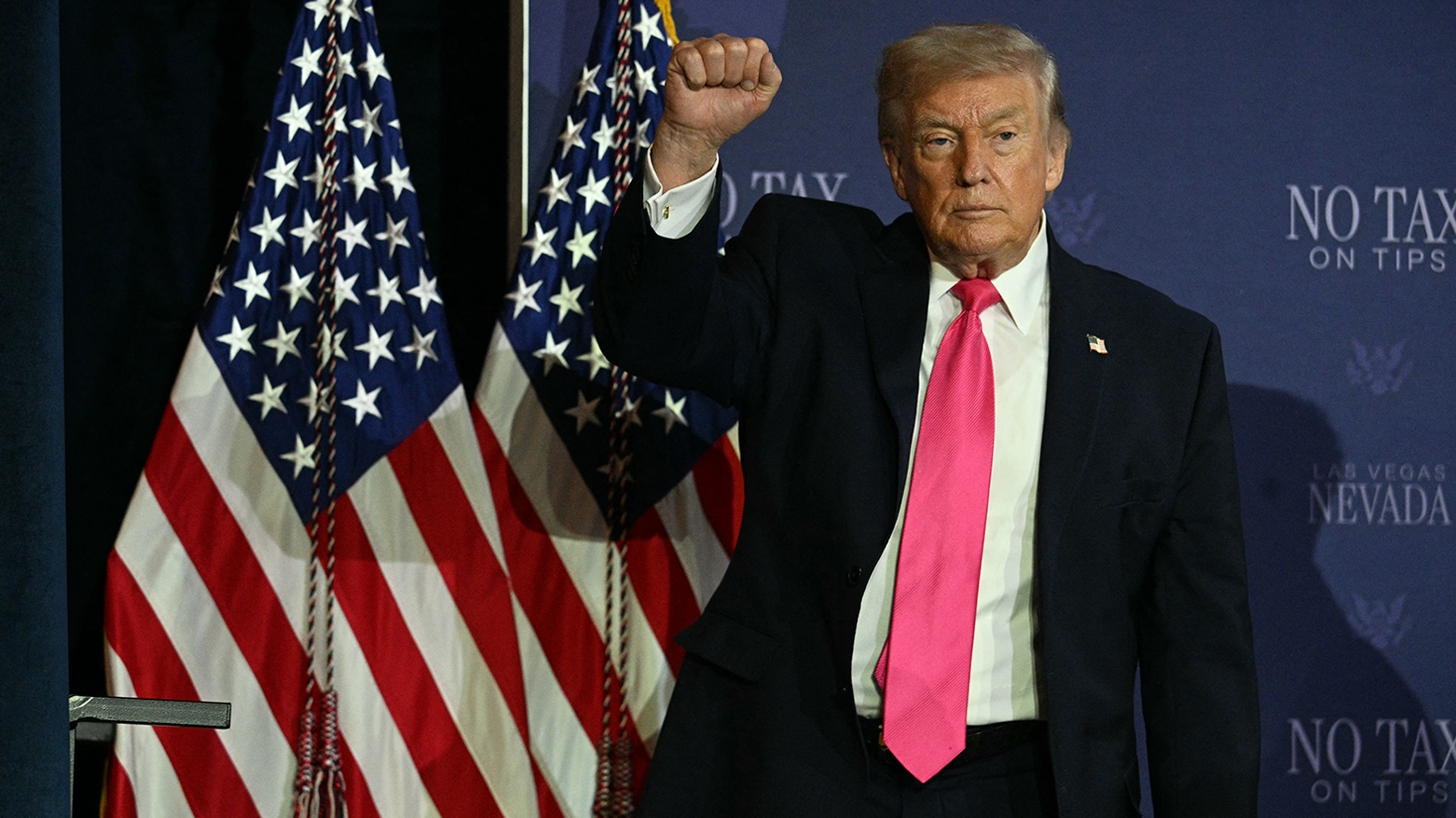 US President Donald Trump (R) makes a fist after a roundtable discussion on his "no tax on tips" policy at the AC Hotel Las Vegas Symphony Park in Las Vegas, Nevada, on Apr. 16, 2026. (AFP)