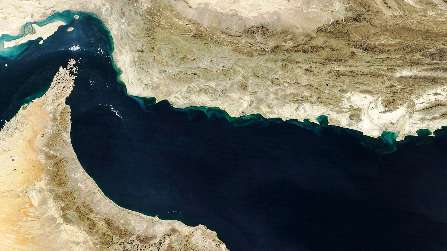 This handout natural-colour image of the Hormuz Strait, acquired with MODIS on NASA’s Terra satellite taken on Feb. 5, 2025. (Photo: AFP)