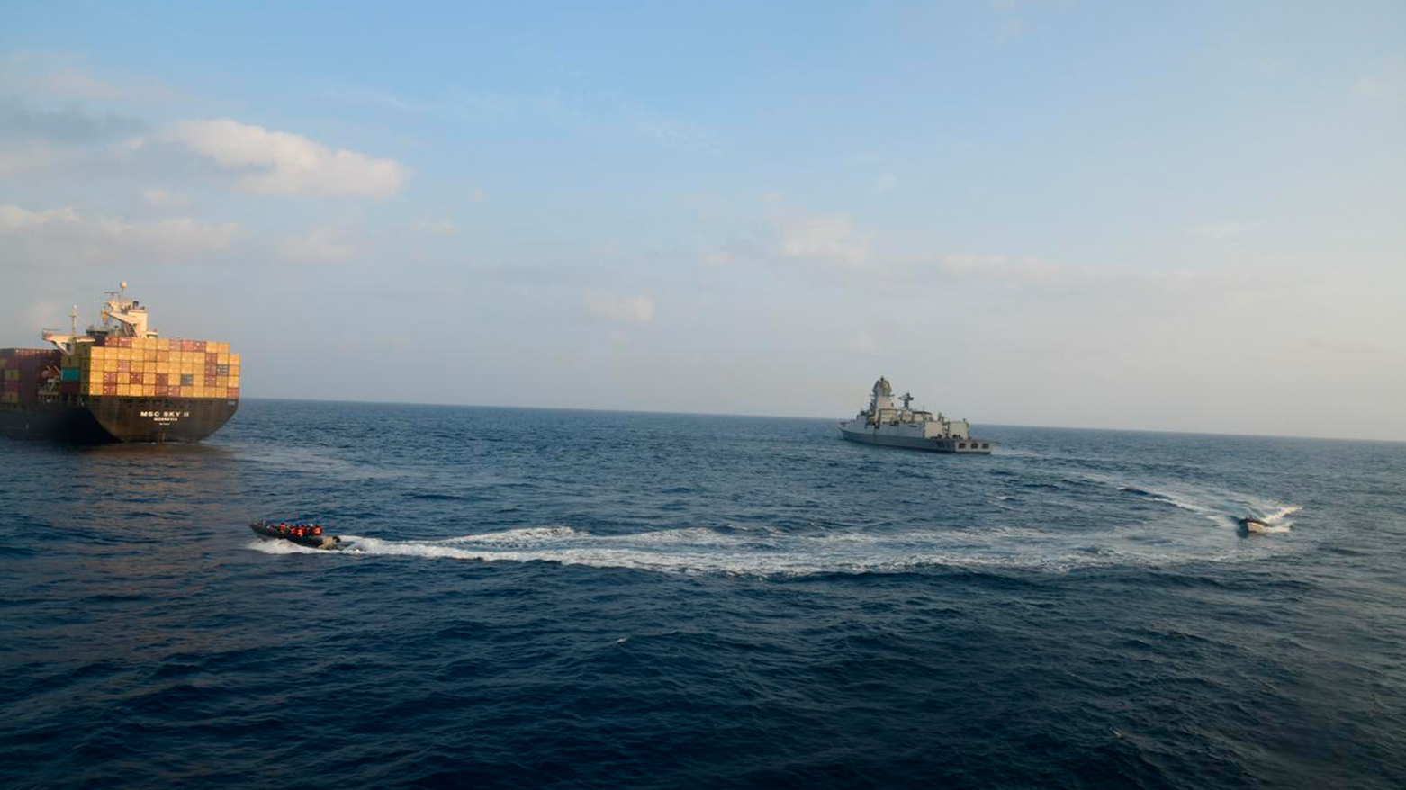 Indian Navy personnel aboard INS Kolkata respond to a fire on the Liberian-flagged merchant ship MSC Sky II after a suspected drone or missile attack in the Gulf of Aden, March 5, 2024. (AP)