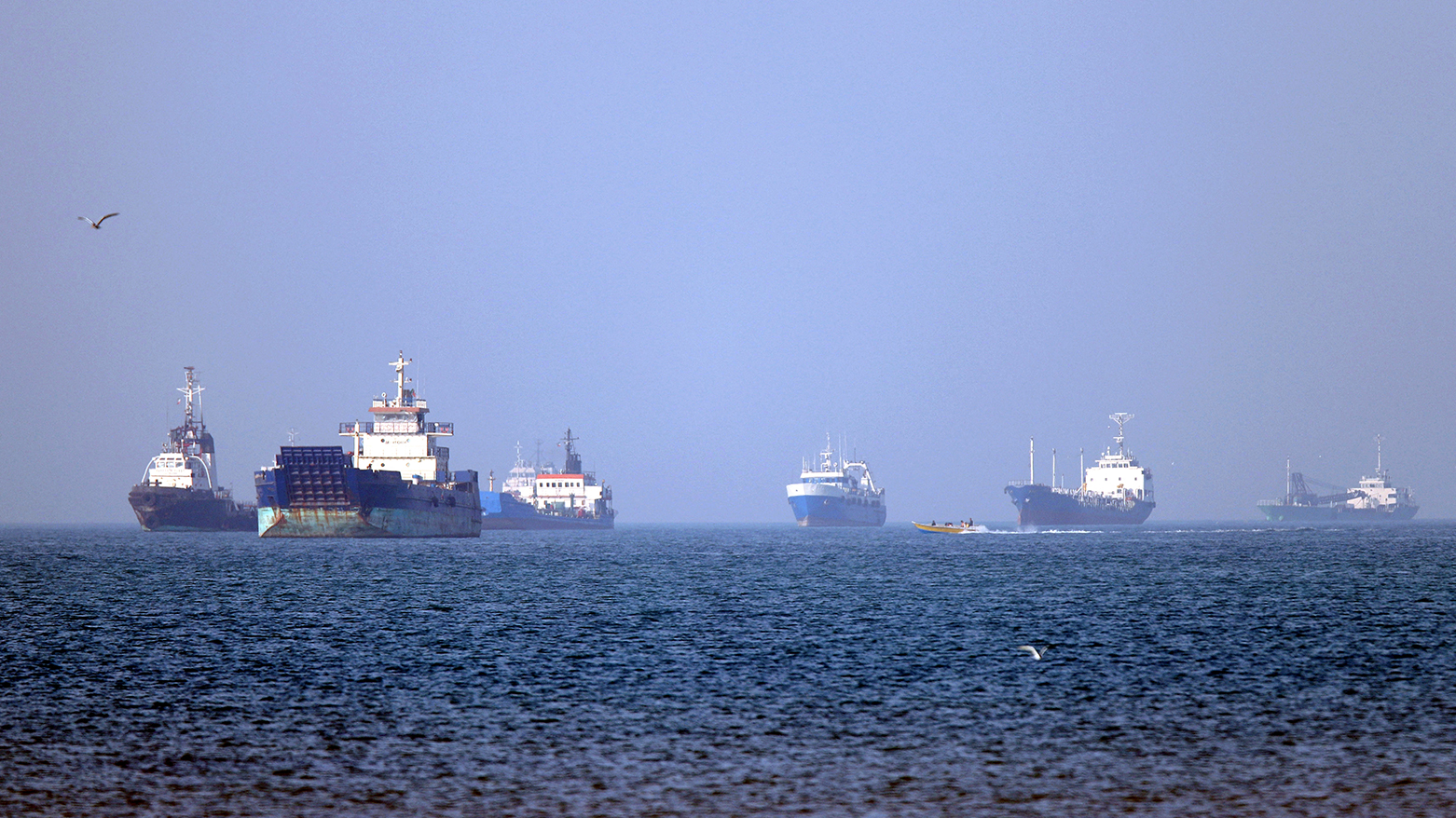 Vessels are pictured anchored in the Strait of Hormuz off Bandar Abbas in southern Iran, May 4, 2026. (AFP via ISNA)