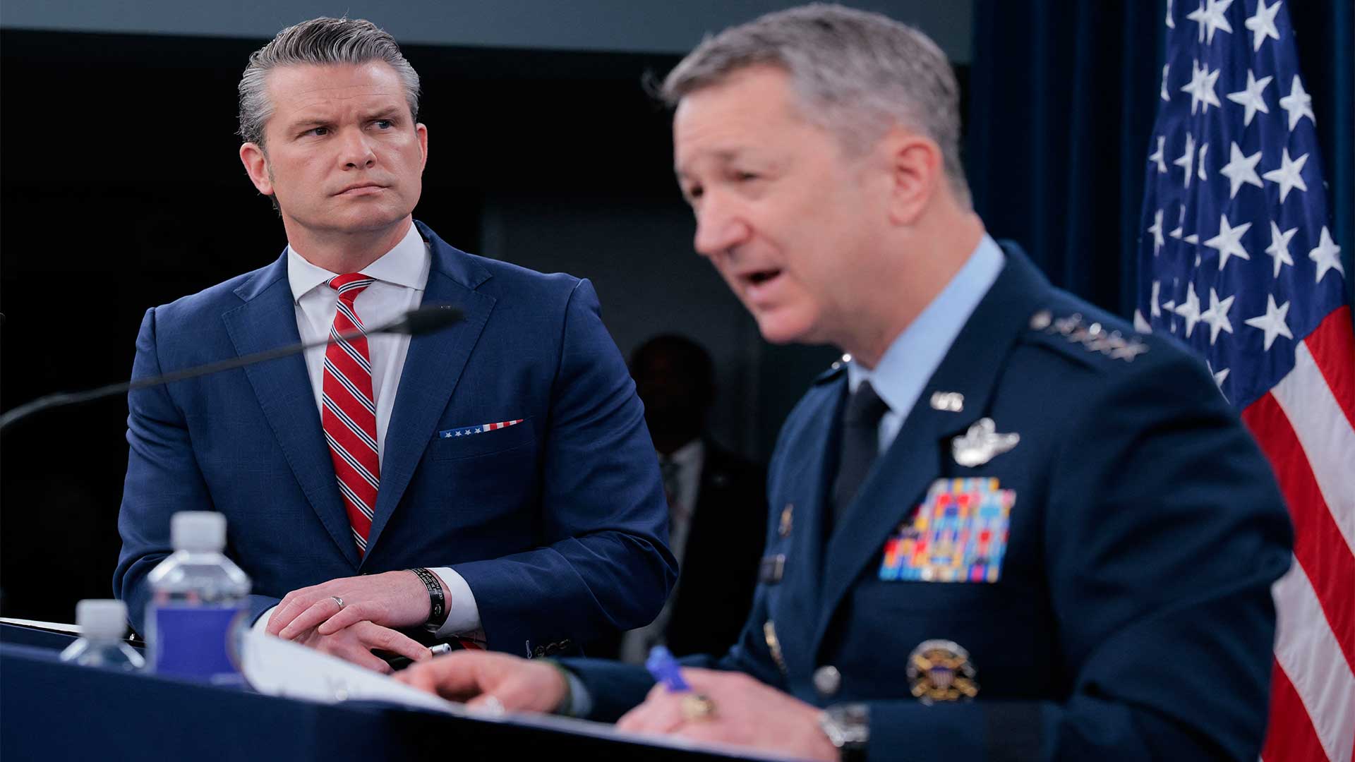U.S. Secretary of War Pete Hegseth (left) looks on as Chairman of the Joint Chiefs of Staff Gen. Dan Caine speaks during a press briefing at the Pentagon on May 05, 2026, in Arlington, Virginia. (Photo: AFP)