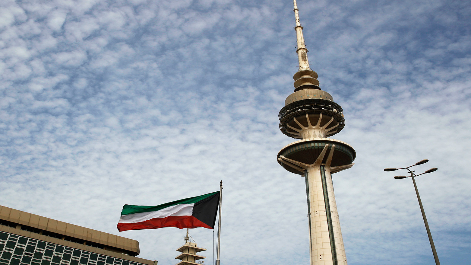 Kuwait's Liberation Tower is seen near a Kuwaiti flag in Kuwait City, Kuwait, Feb. 12, 2018. (AP)