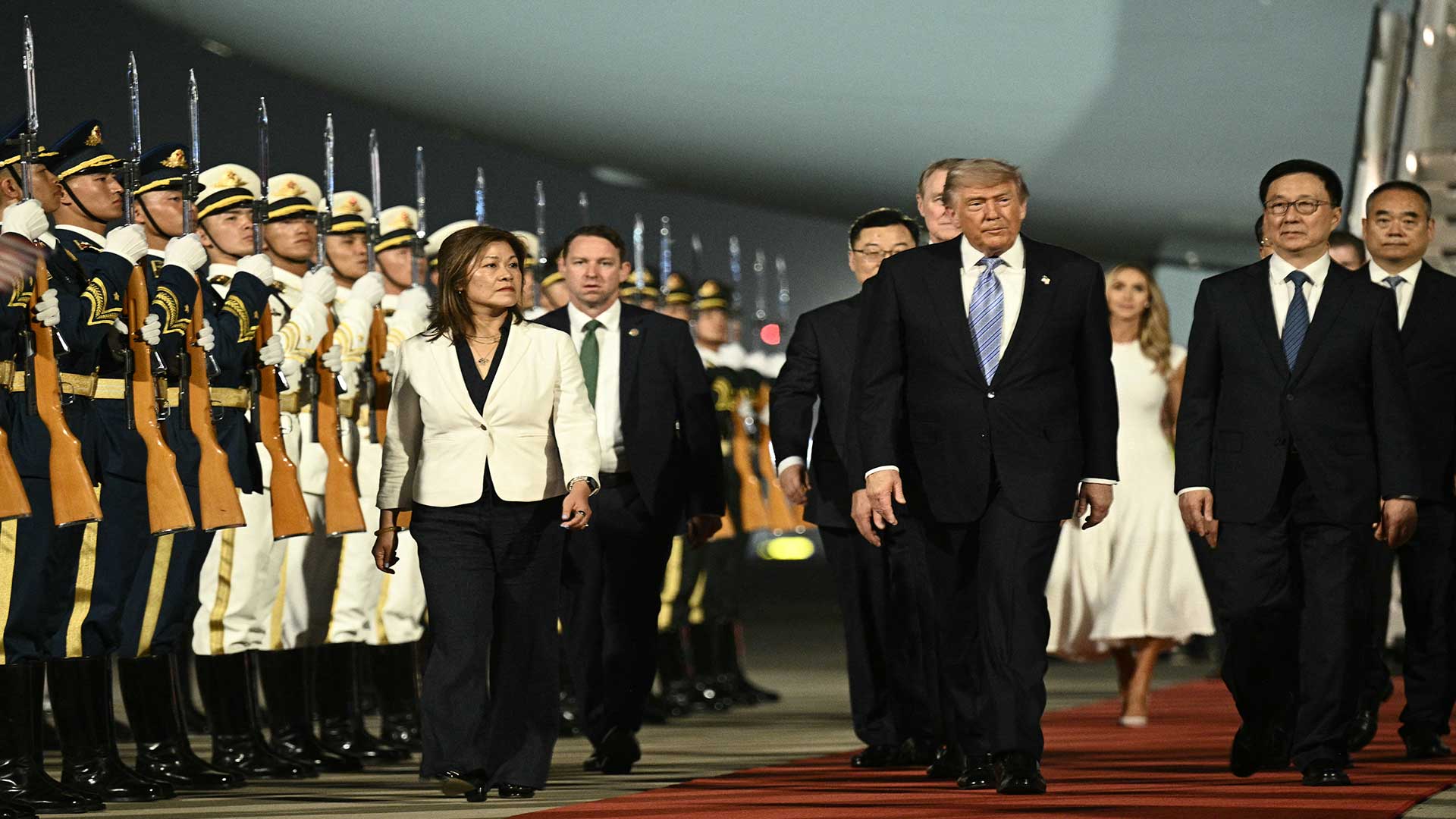 US President Donald Trump is escorted by China's Vice President Han Zheng upon his arrival at Beijing Capital Airport in Beijing on May 13, 2026. (Photo: AFP)