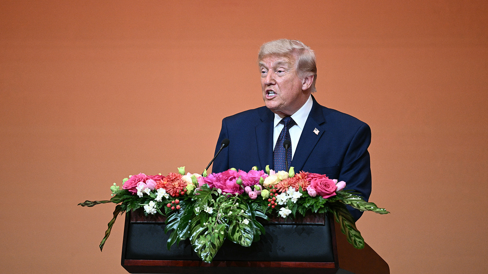 US President Donald Trump makes a speech as he attends a state banquet with China's President Xi Jinping at the Great Hall of the People in Beijing on May 14, 2026. (AFP)