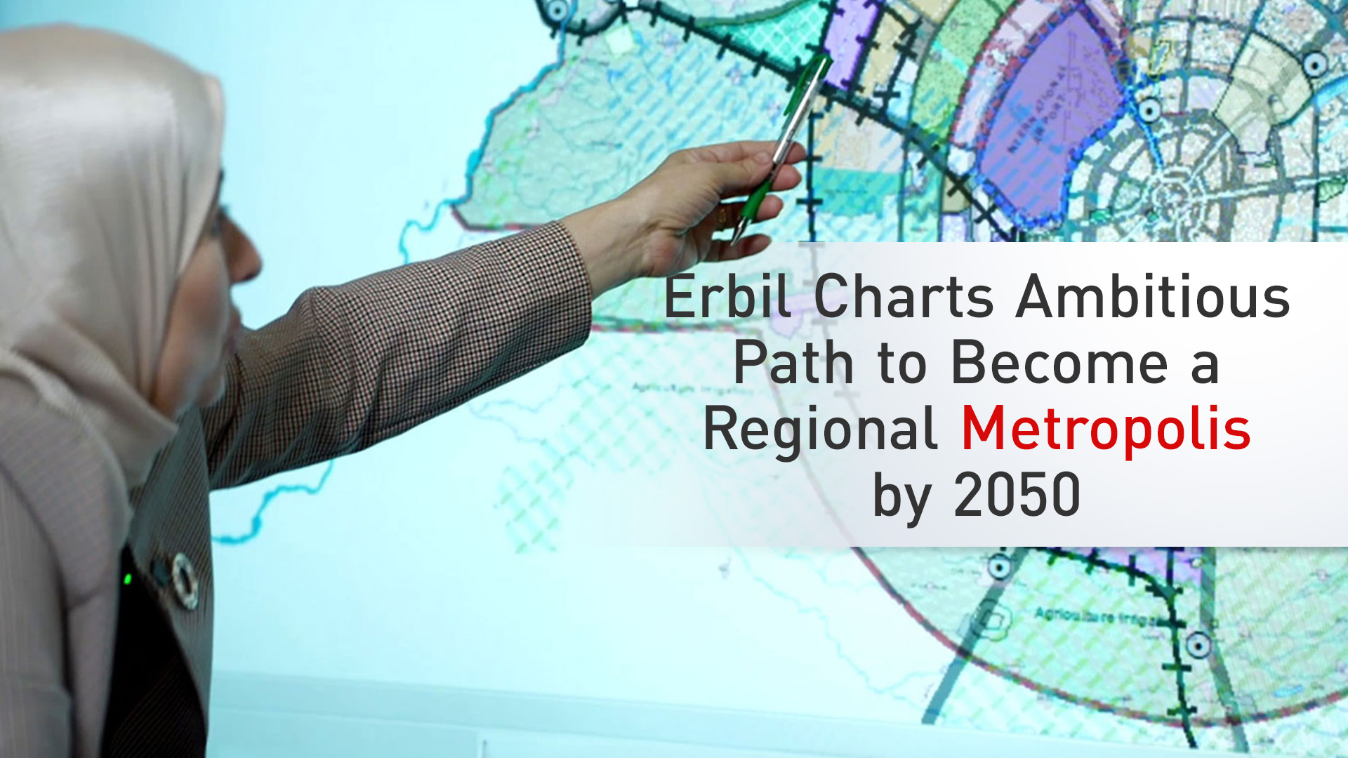 Shukria Abbas Qadir, the Director of Erbil Urban Planning, pointing to a section of the masterplan of Erbil. (Photo: Kurdistan24)