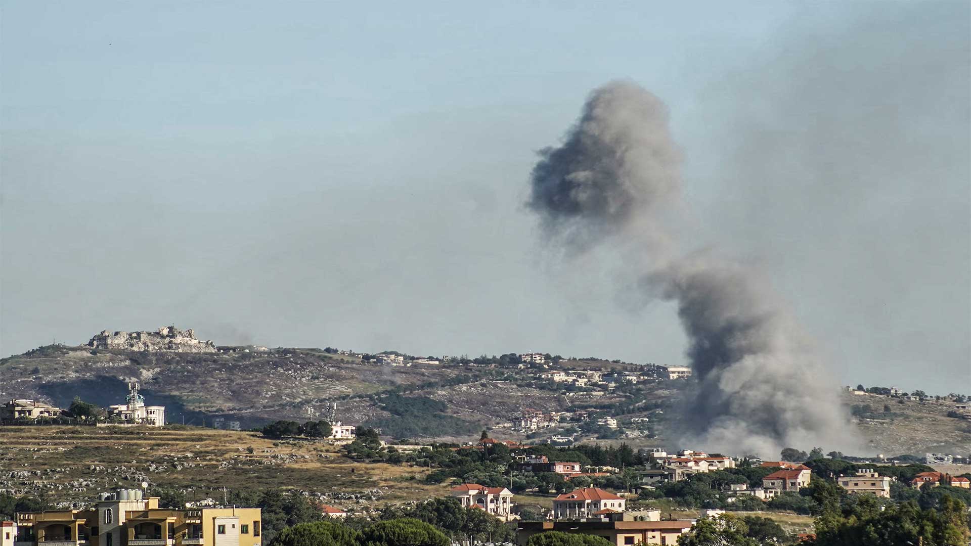 A photograph taken from the southern area of Nabatieh shows smoke rising from the site of an israeli airstrike in the village of Nabatieh al-Fawqa, with the Beaufort Castle visible in the background, on June 4, 2026. (Photo: AFP)