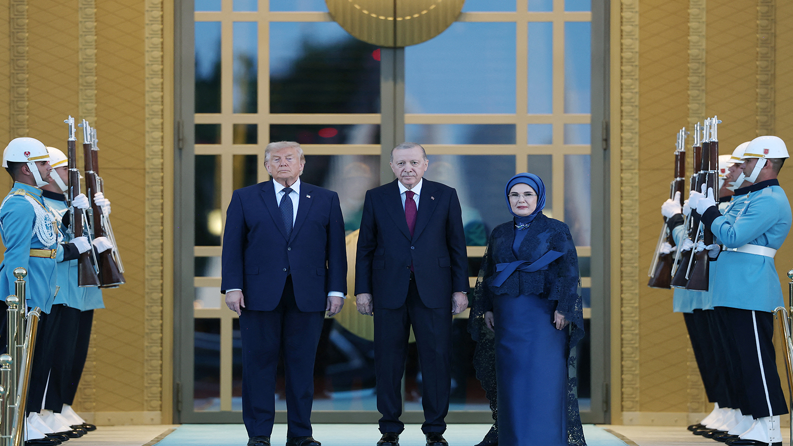 US President Donald Trump (L), Turkish President Recep Tayyip Erdogan, and first lady Emine Erdogan pose during a reception for leaders attending the NATO summit in Ankara on July 7, 2026. (AFP)