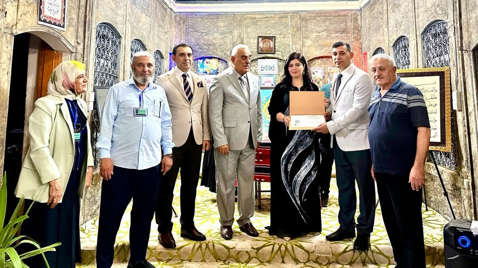 خانمە کوردێک بەشداری لە فێستیڤاڵێکی خۆشنووسیدا کرد