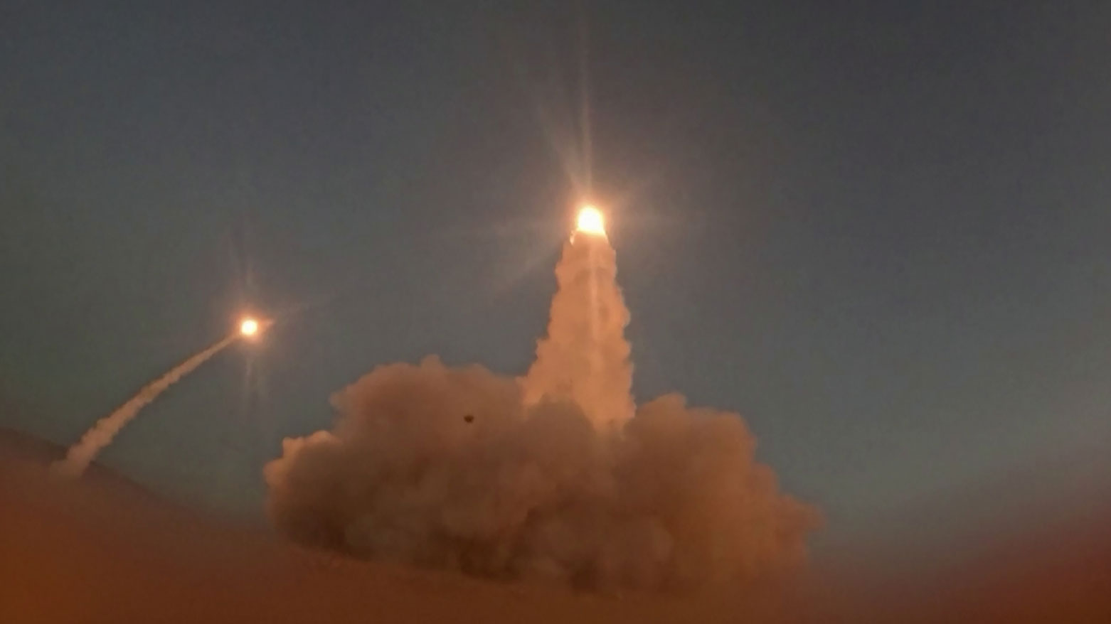 Screen grab from IRGC video allegedly showing missiles launched at U.S. targets. (AFP)